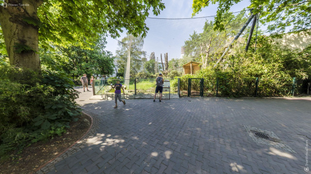 An aviary with a chimpanzee at the Berlin Zoo