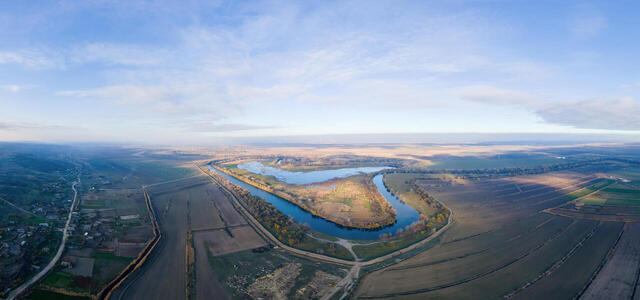 panorama-nature-moldova-dniester-village-with-contry-roads-fields-extending-horizon-view-from-drone